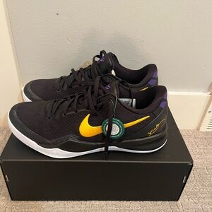 Nike Black and Yellow Athletic Shoes with Classic Silhouette